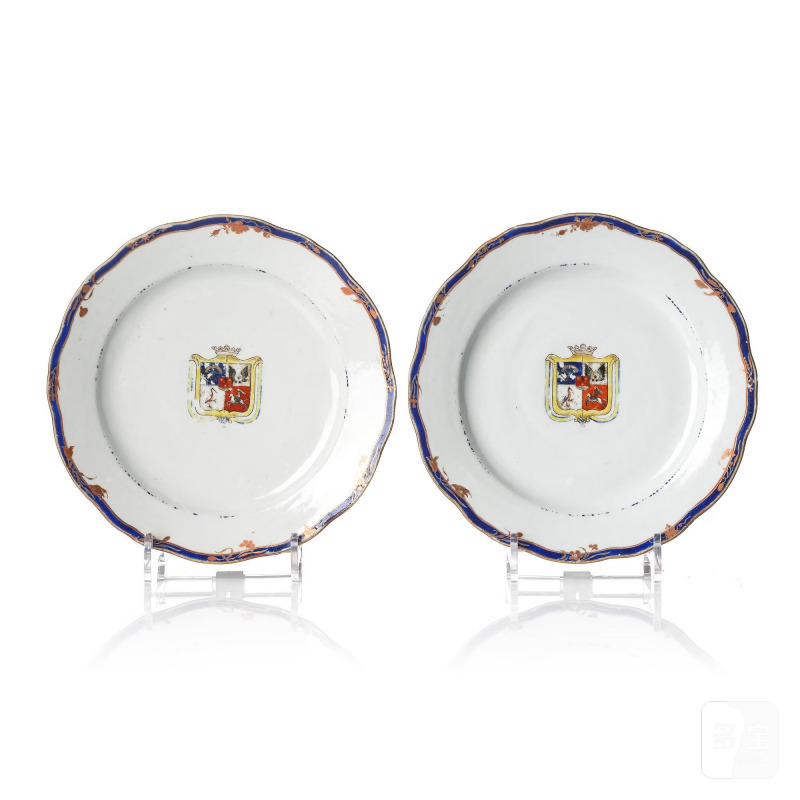A pair of 'Chinese Export' armorial dinner plates,